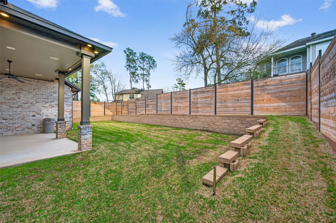 12379 Pebble View Drive Conroe, TX 77304 - Photo 45 of 49 a view of a backyard