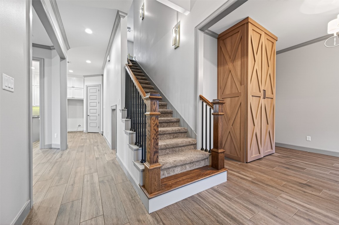 12379 Pebble View Drive Conroe, TX 77304 - Photo 5 of 49 a view of entryway with wooden floor and stairs