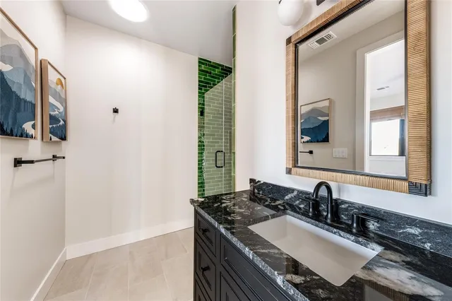 a bathroom with a toilet and a sink