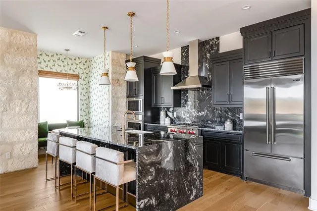 a view of hallway with wooden floor