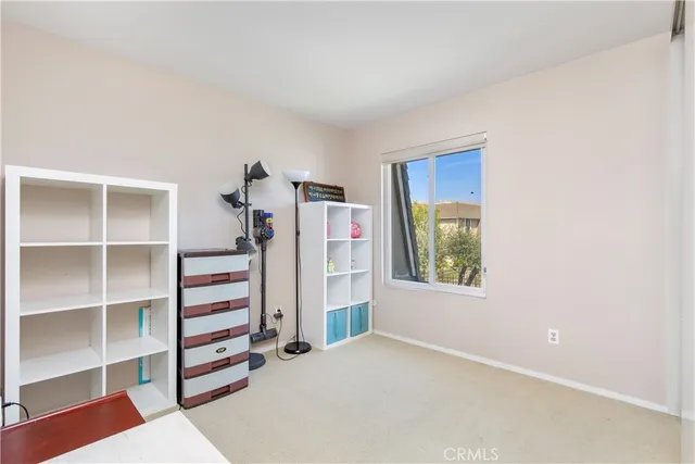 a view of livingroom with furniture and window