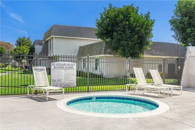 a view of a house with a swimming pool
