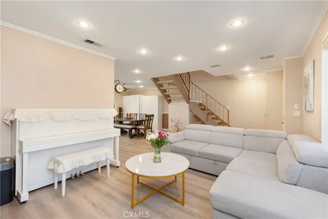a living room with furniture and a table