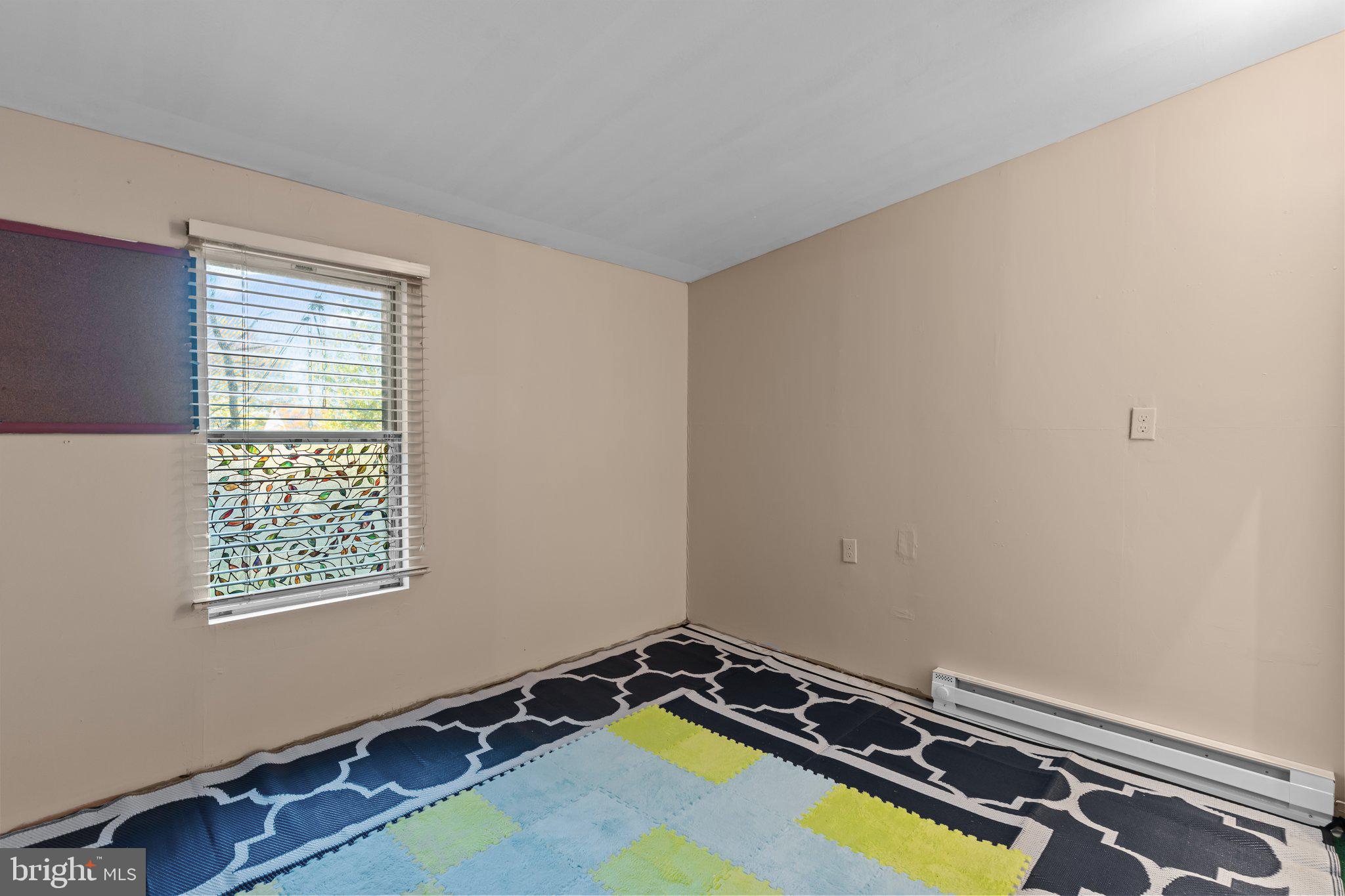 129 Blake Avenue Rockledge, PA 19046 - Photo 13 of 19 a room with a window