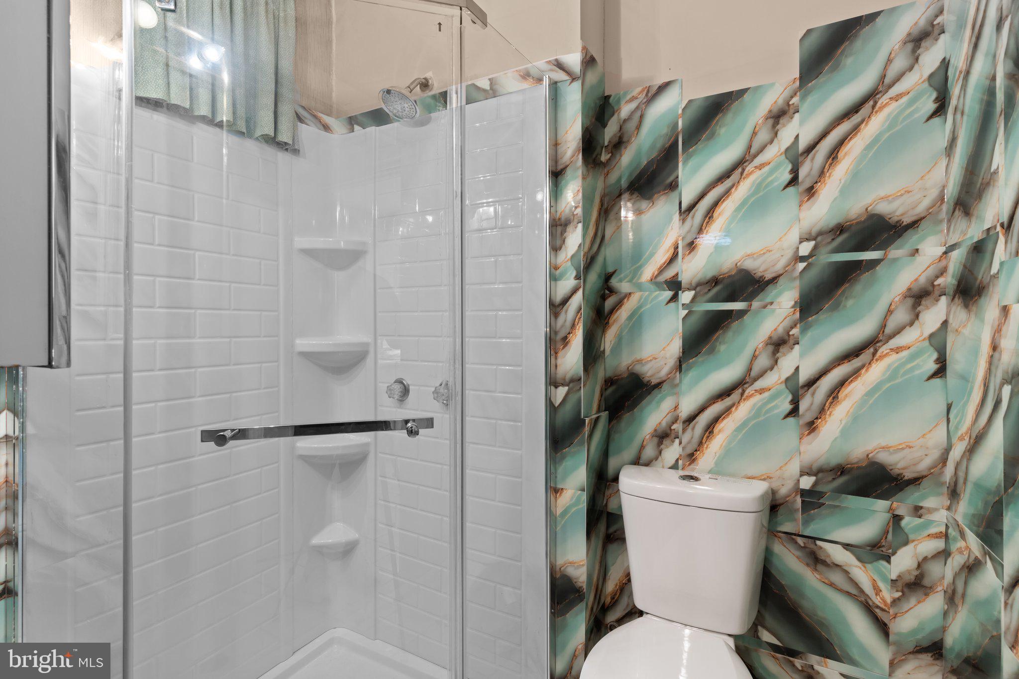 129 Blake Avenue Rockledge, PA 19046 - Photo 14 of 19 a bathroom with a toilet and a shower