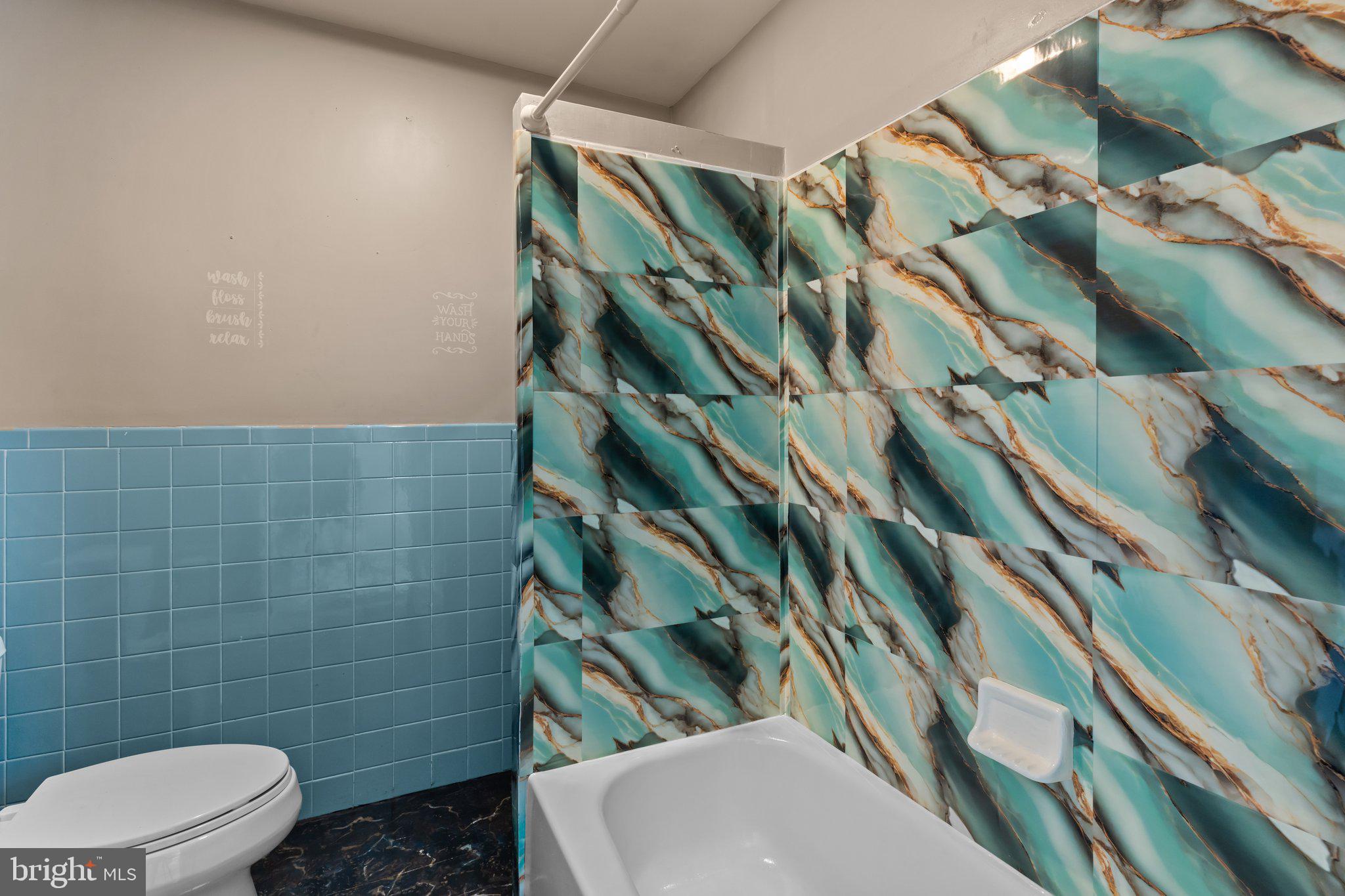 129 Blake Avenue Rockledge, PA 19046 - Photo 16 of 19 a bathroom with a toilet and shower