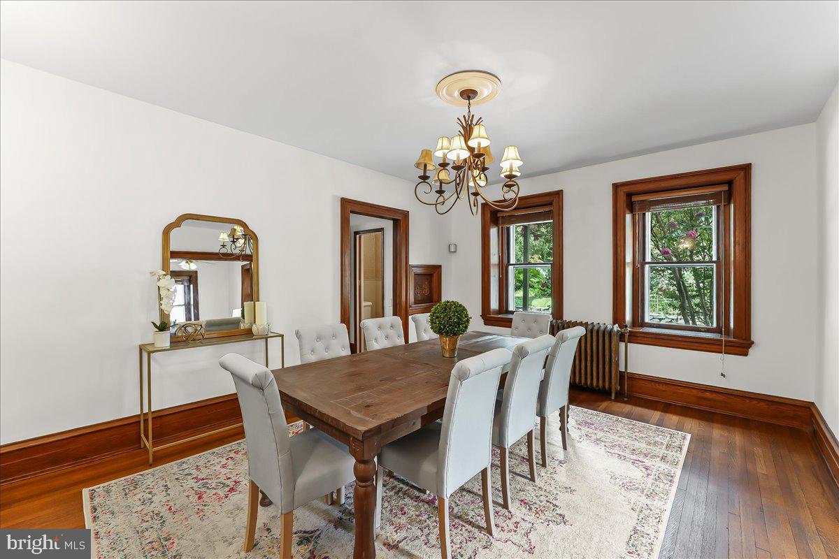 503 West State Street Kennett Square, PA 19348 - Photo 14 of 76 a view of a dining room with furniture and wooden floor