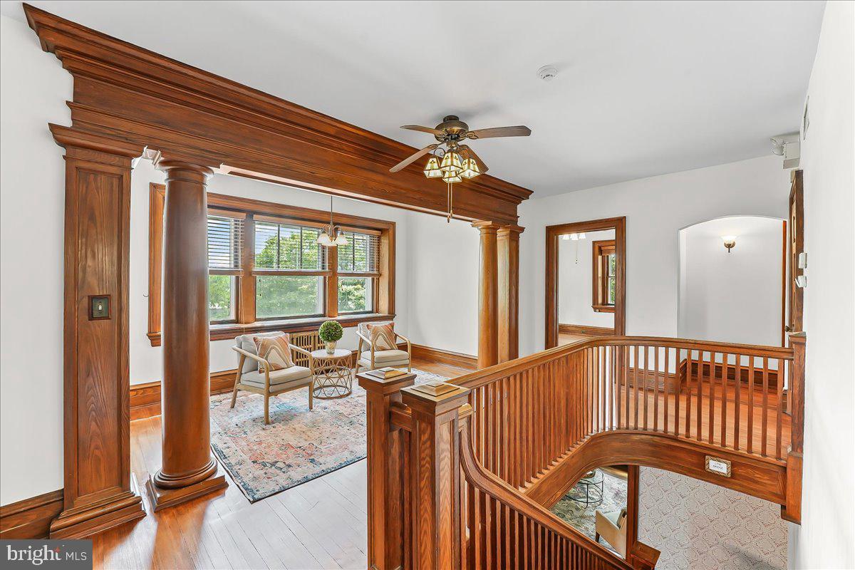 503 West State Street Kennett Square, PA 19348 - Photo 24 of 76 a view of a balcony with furniture and wooden floor