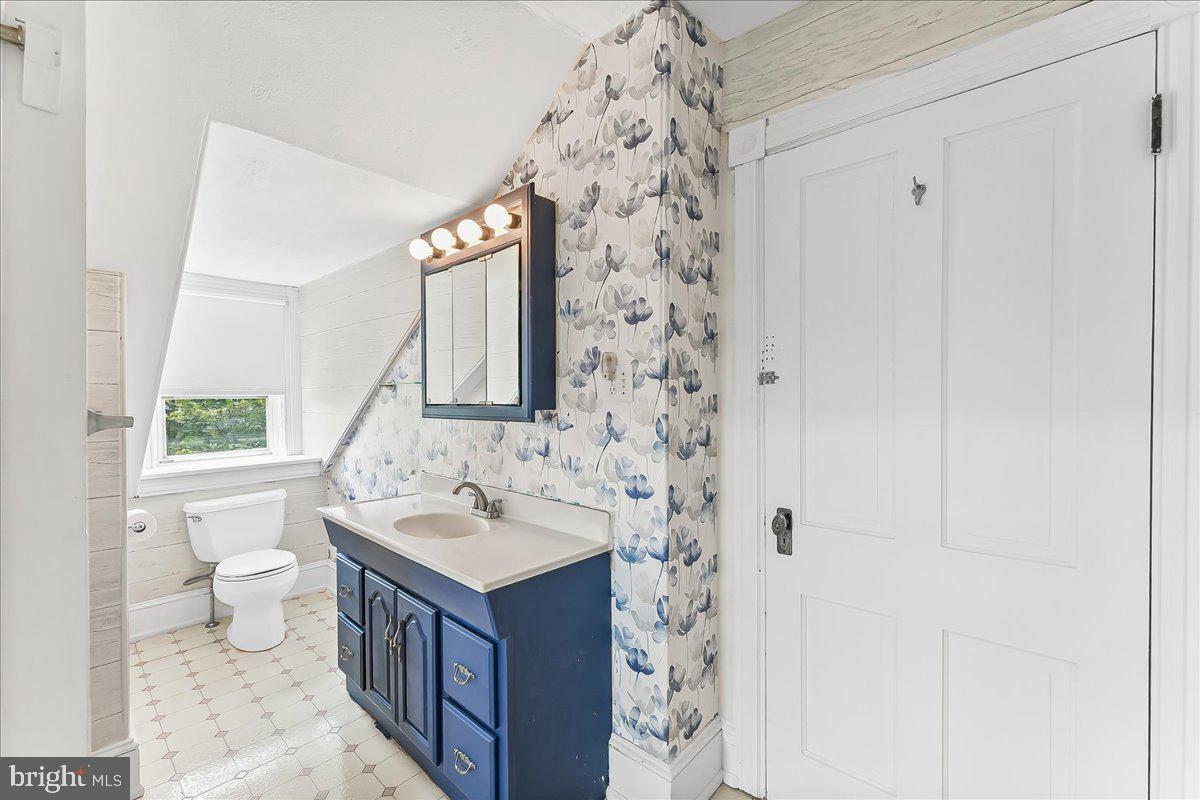 503 West State Street Kennett Square, PA 19348 - Photo 44 of 76 a bathroom with a sink and a mirror
