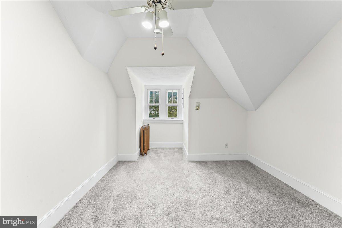 503 West State Street Kennett Square, PA 19348 - Photo 45 of 76 an empty room with chandelier fan