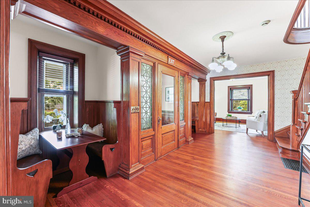 503 West State Street Kennett Square, PA 19348 - Photo 7 of 76 a view of a dining room with furniture window and wooden floor