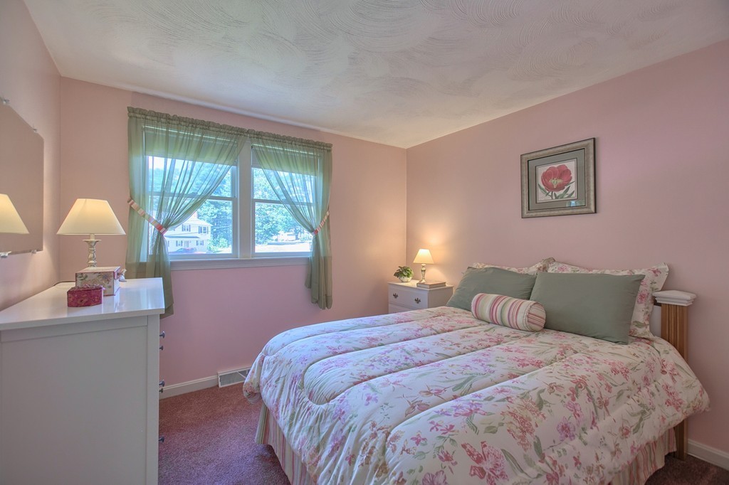 130 Ferncroft Road Tewksbury, MA 01876 - Photo 17 of 29 a bedroom with a bed and window