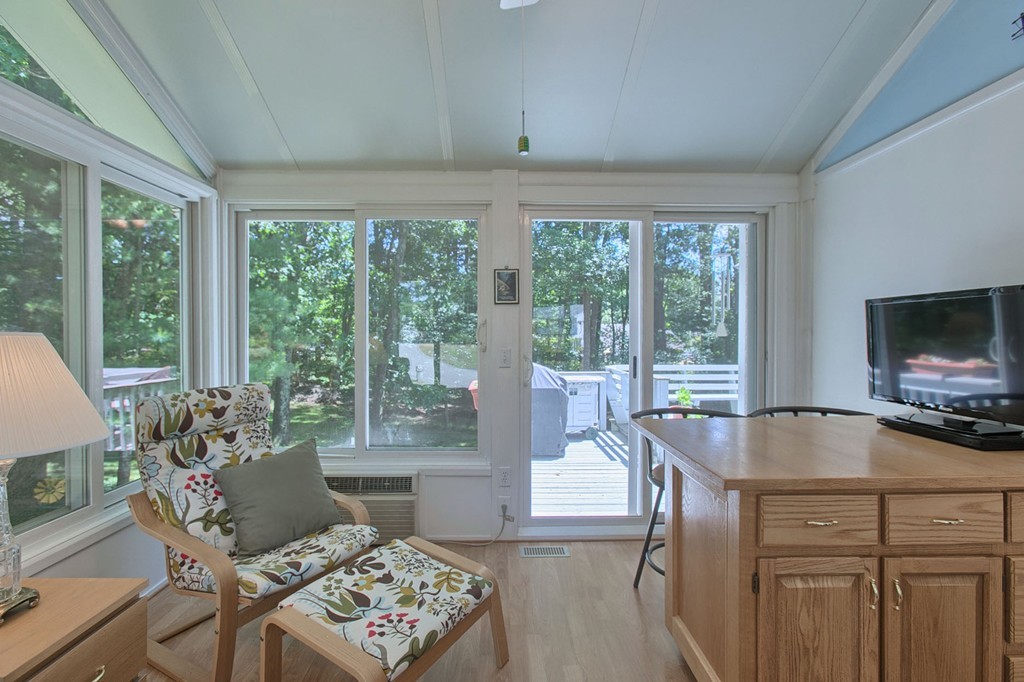 130 Ferncroft Road Tewksbury, MA 01876 - Photo 4 of 29 a living room with furniture and a flat screen tv