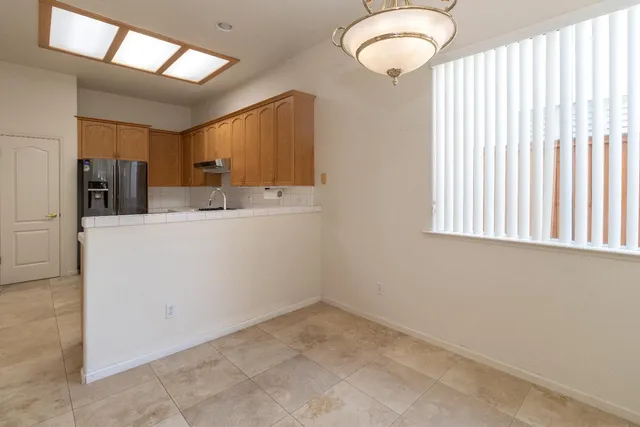 a view of a kitchen with a sink