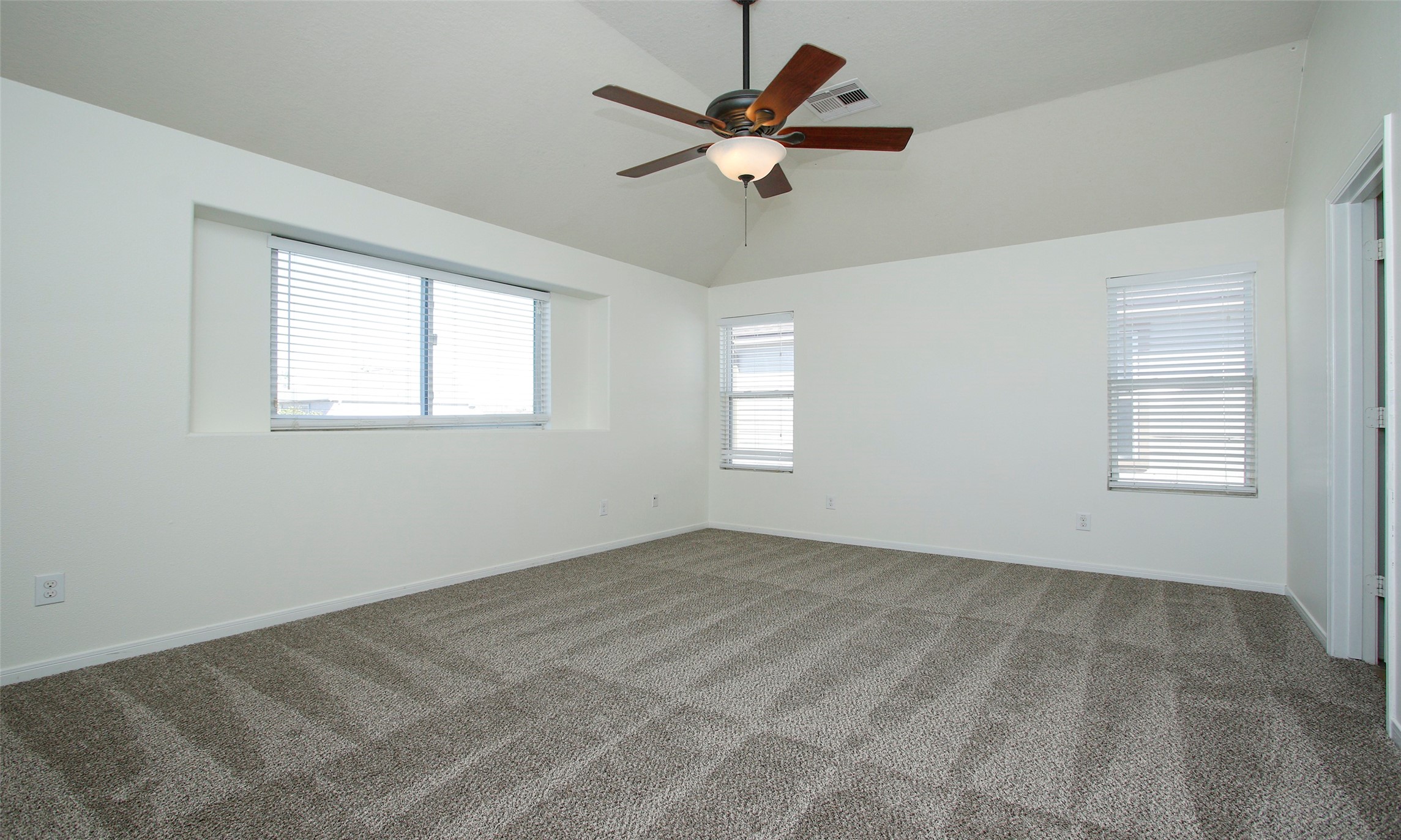 9812 Expedition Trail Conroe, TX 77385 - Photo 31 of 37 a view of an empty room with a window