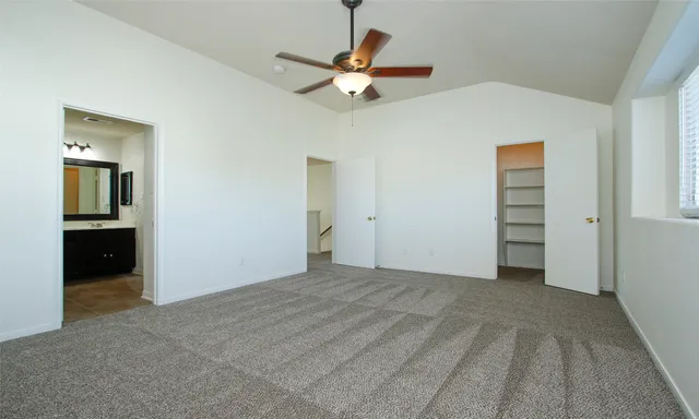 a view of a livingroom with a ceiling fan