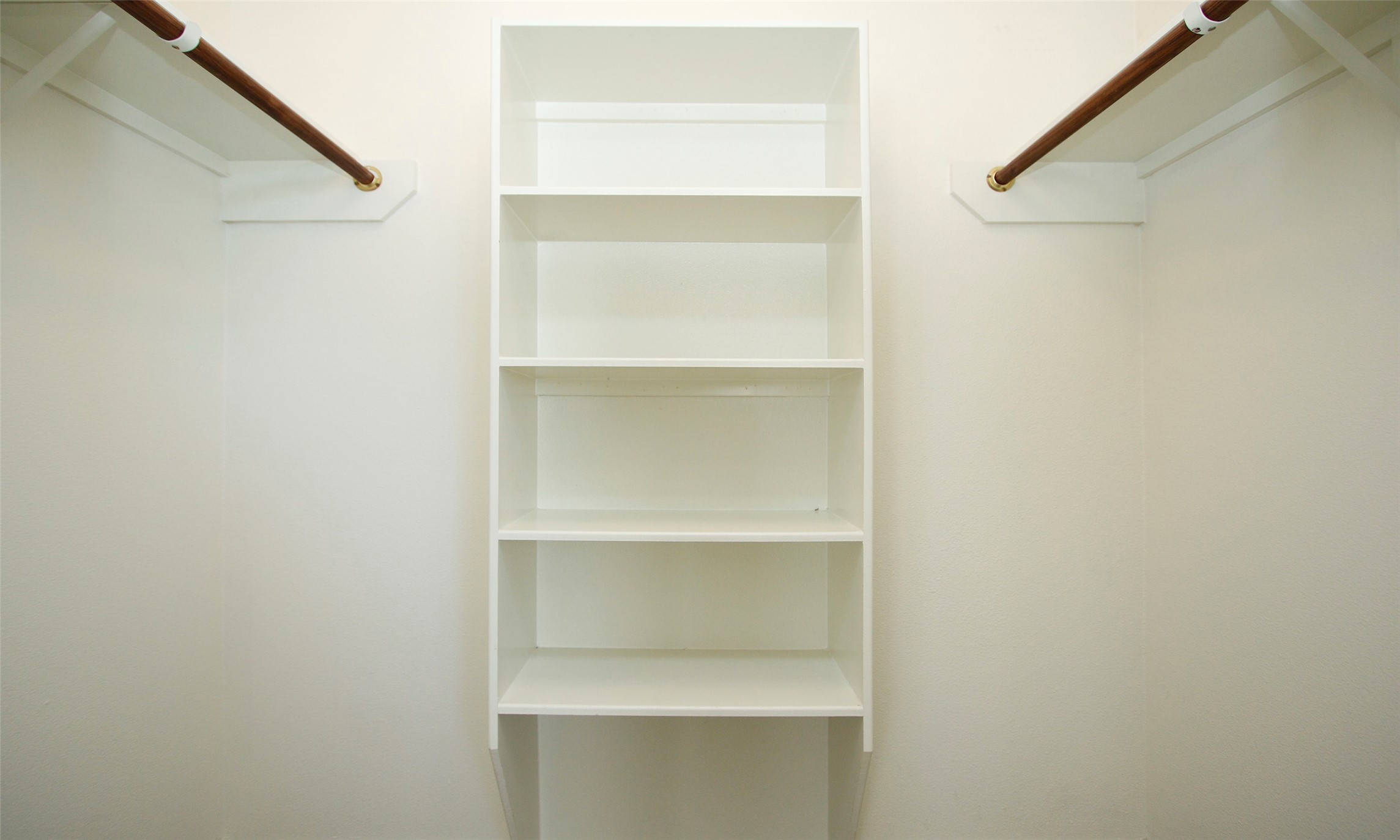 9812 Expedition Trail Conroe, TX 77385 - Photo 33 of 37 a view of an empty walk in closet