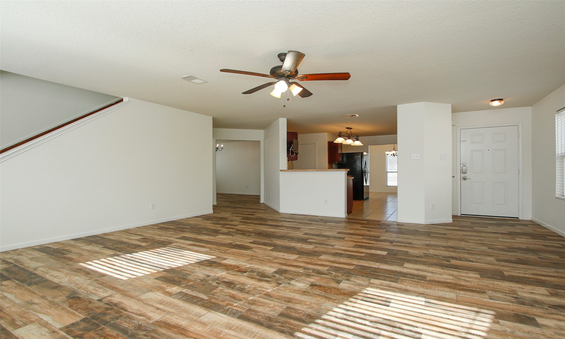 9812 Expedition Trail Conroe, TX 77385 - Photo 8 of 37 a view of a room with a kitchen