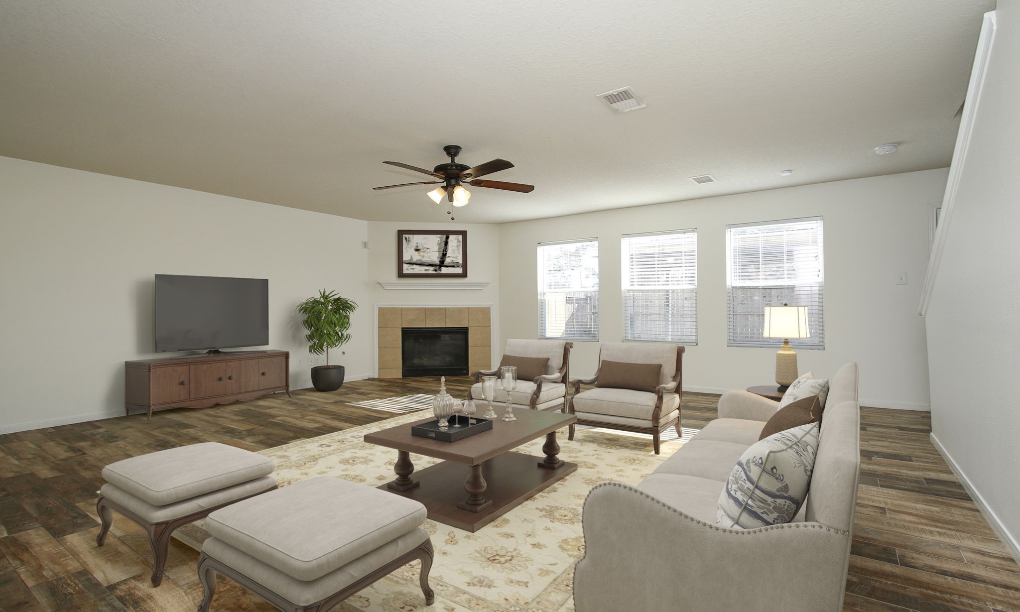 9812 Expedition Trail Conroe, TX 77385 - Photo 10 of 37 a living room with furniture a fireplace and a flat screen tv