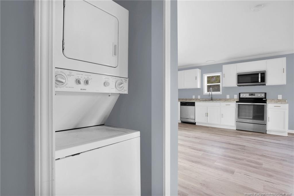 266 Brower Road Cameron, NC 28326 - Photo 15 of 26 a view of kitchen with washer and dryer