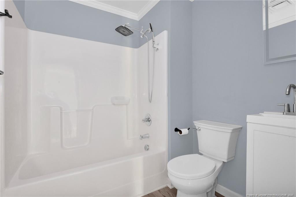 266 Brower Road Cameron, NC 28326 - Photo 19 of 26 a white toilet sitting next to a bath tub