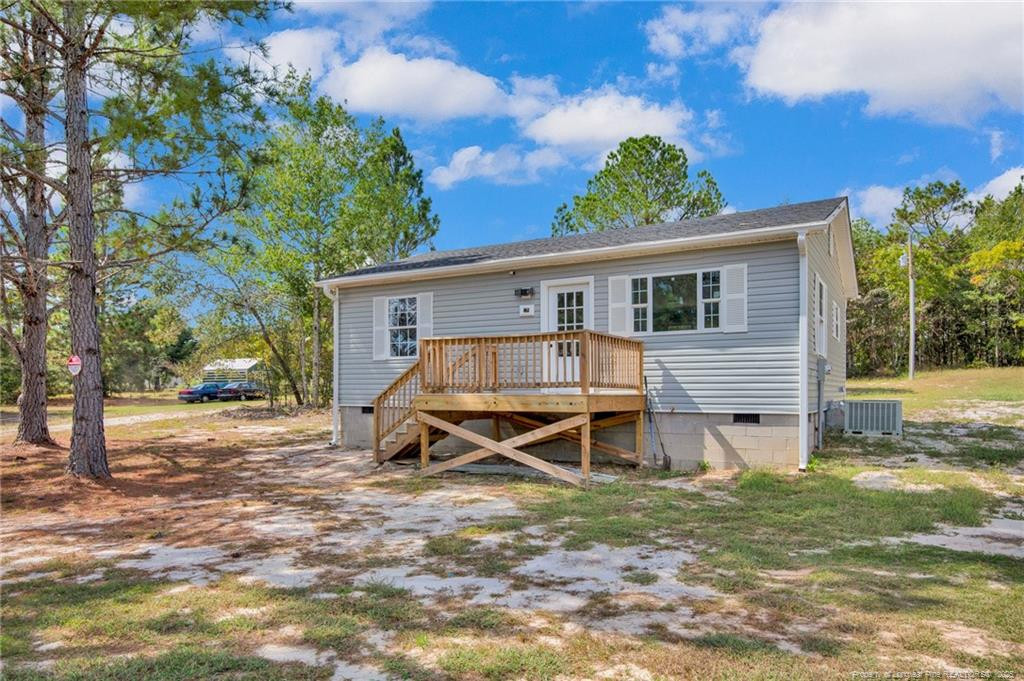 266 Brower Road Cameron, NC 28326 - Photo 2 of 26 a view of a house with a backyard and a tree