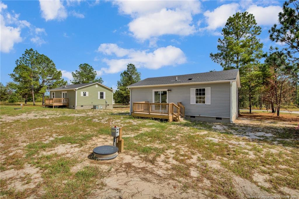 266 Brower Road Cameron, NC 28326 - Photo 5 of 26 a view of a house with backyard and a tree