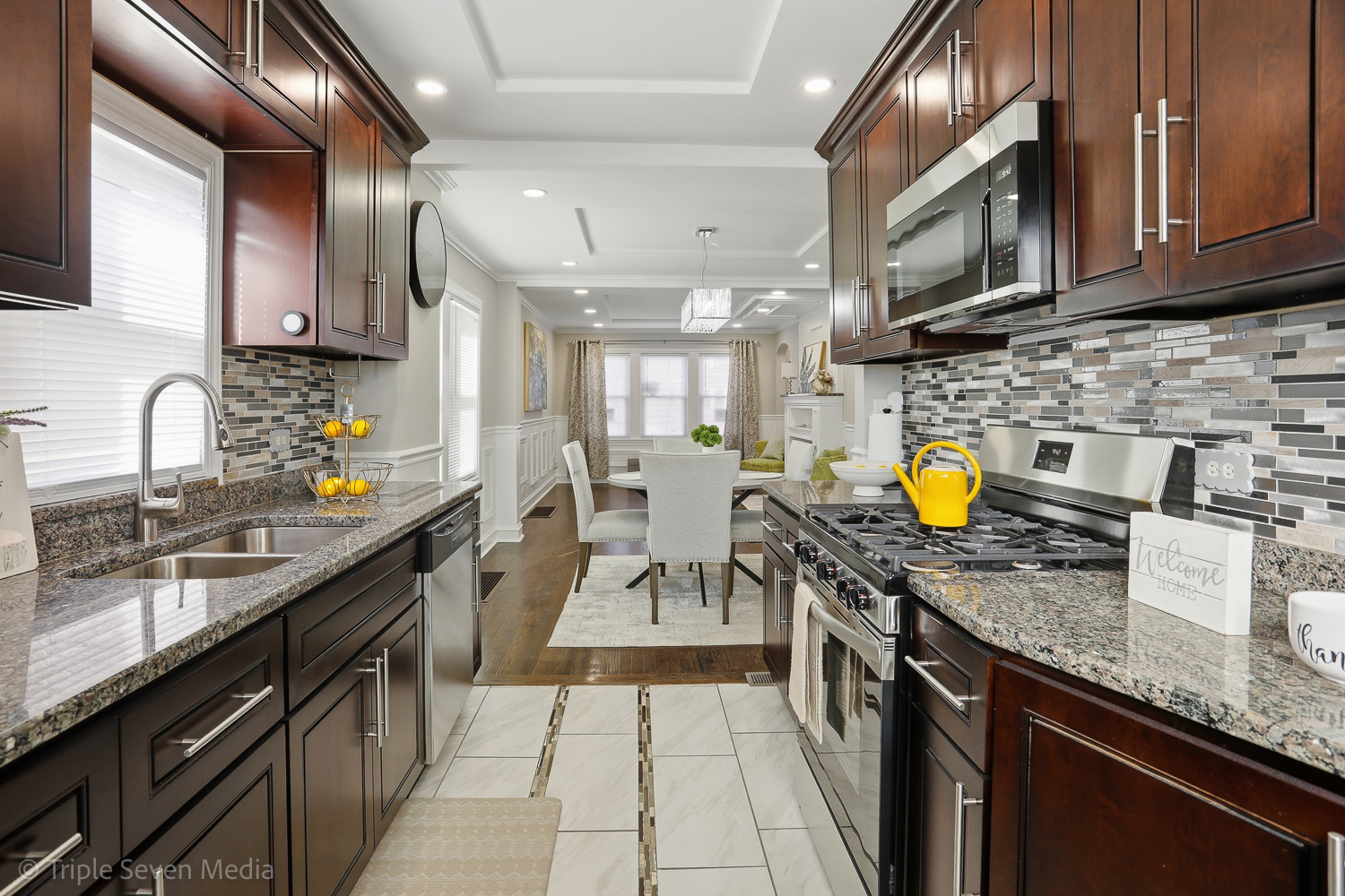 9149 South Aberdeen Street Chicago, IL 60620 - Photo 11 of 46 a kitchen with a sink appliances and cabinets
