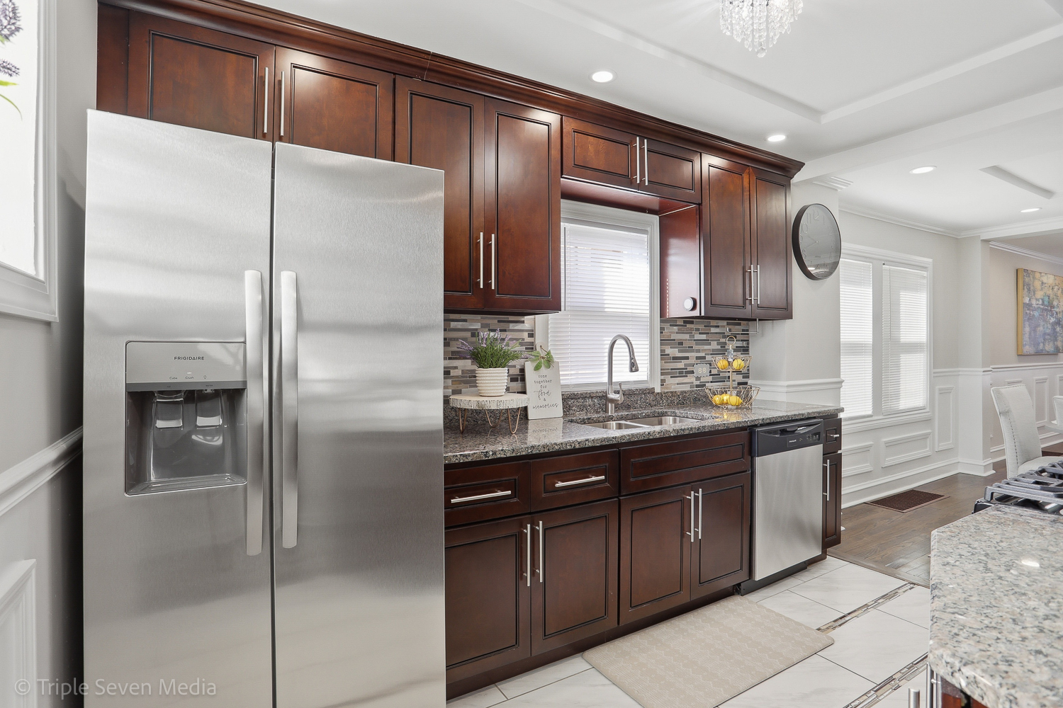 9149 South Aberdeen Street Chicago, IL 60620 - Photo 12 of 46 a kitchen with a refrigerator and a sink