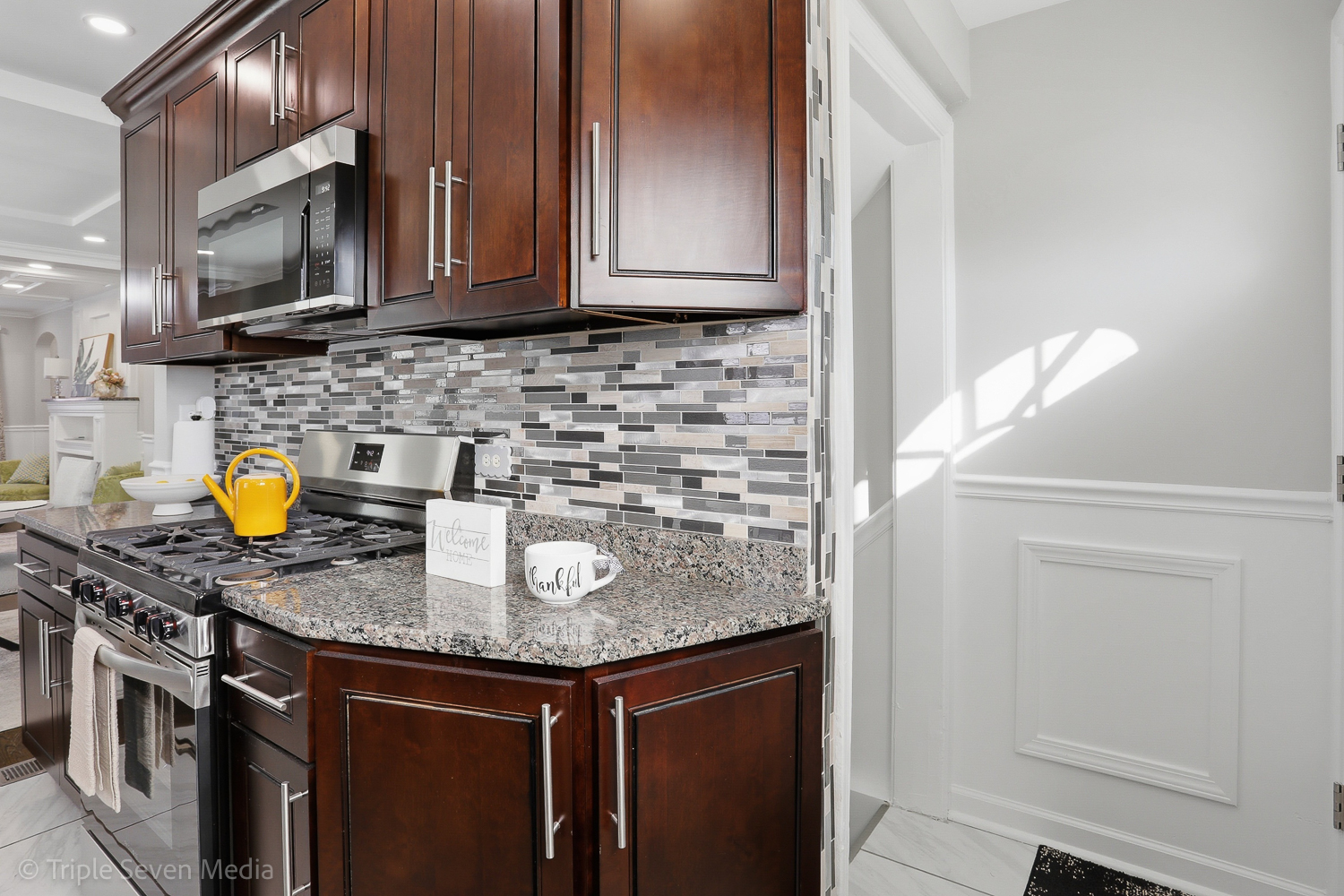 9149 South Aberdeen Street Chicago, IL 60620 - Photo 13 of 46 a kitchen with stainless steel appliances granite countertop a sink stove and microwave