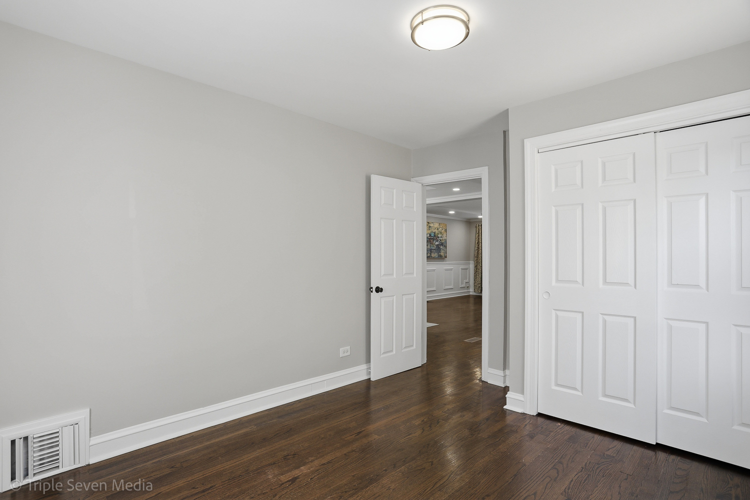 9149 South Aberdeen Street Chicago, IL 60620 - Photo 17 of 46 a view of a livingroom with wooden floor