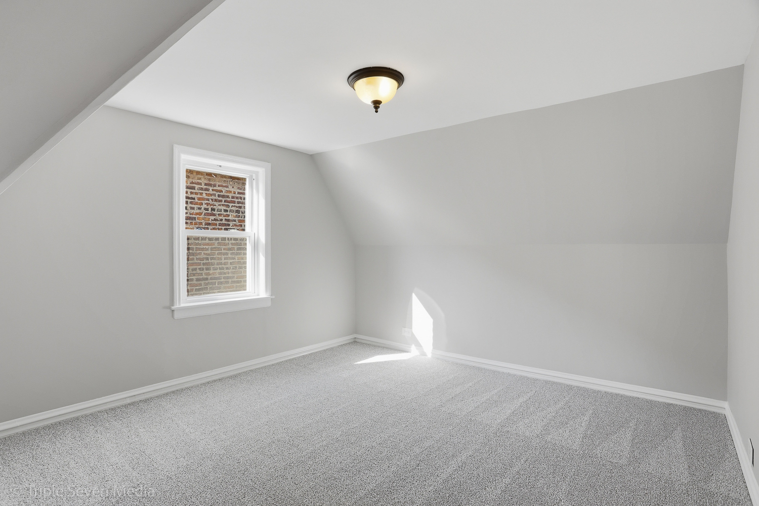 9149 South Aberdeen Street Chicago, IL 60620 - Photo 23 of 46 a view of an empty room with a window