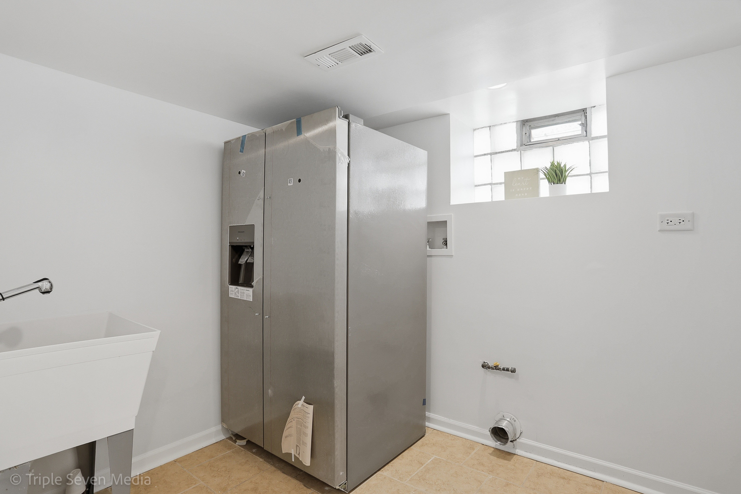 9149 South Aberdeen Street Chicago, IL 60620 - Photo 39 of 46 a bathroom with a shower and a sink