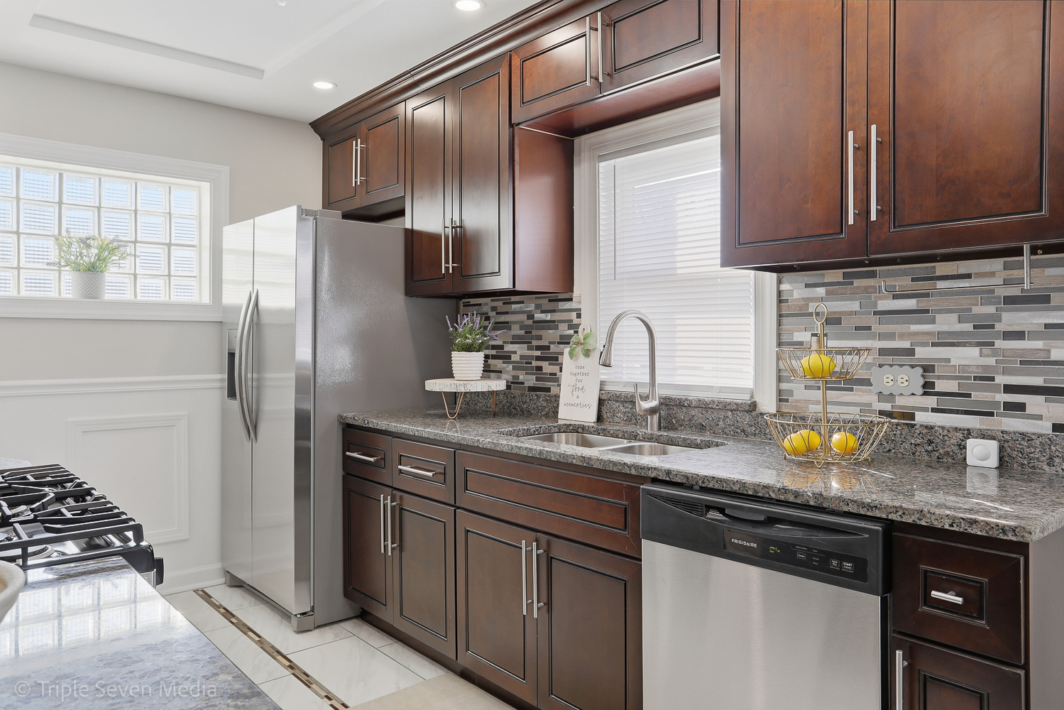 9149 South Aberdeen Street Chicago, IL 60620 - Photo 10 of 46 a kitchen with stainless steel appliances granite countertop a sink stove and refrigerator