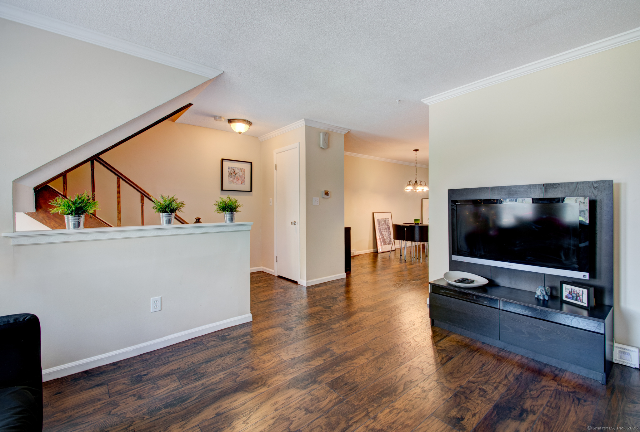 184 Gravel Street, Unit 26 Meriden, CT 06450 - Photo 10 of 27 a living room with furniture and a flat screen tv