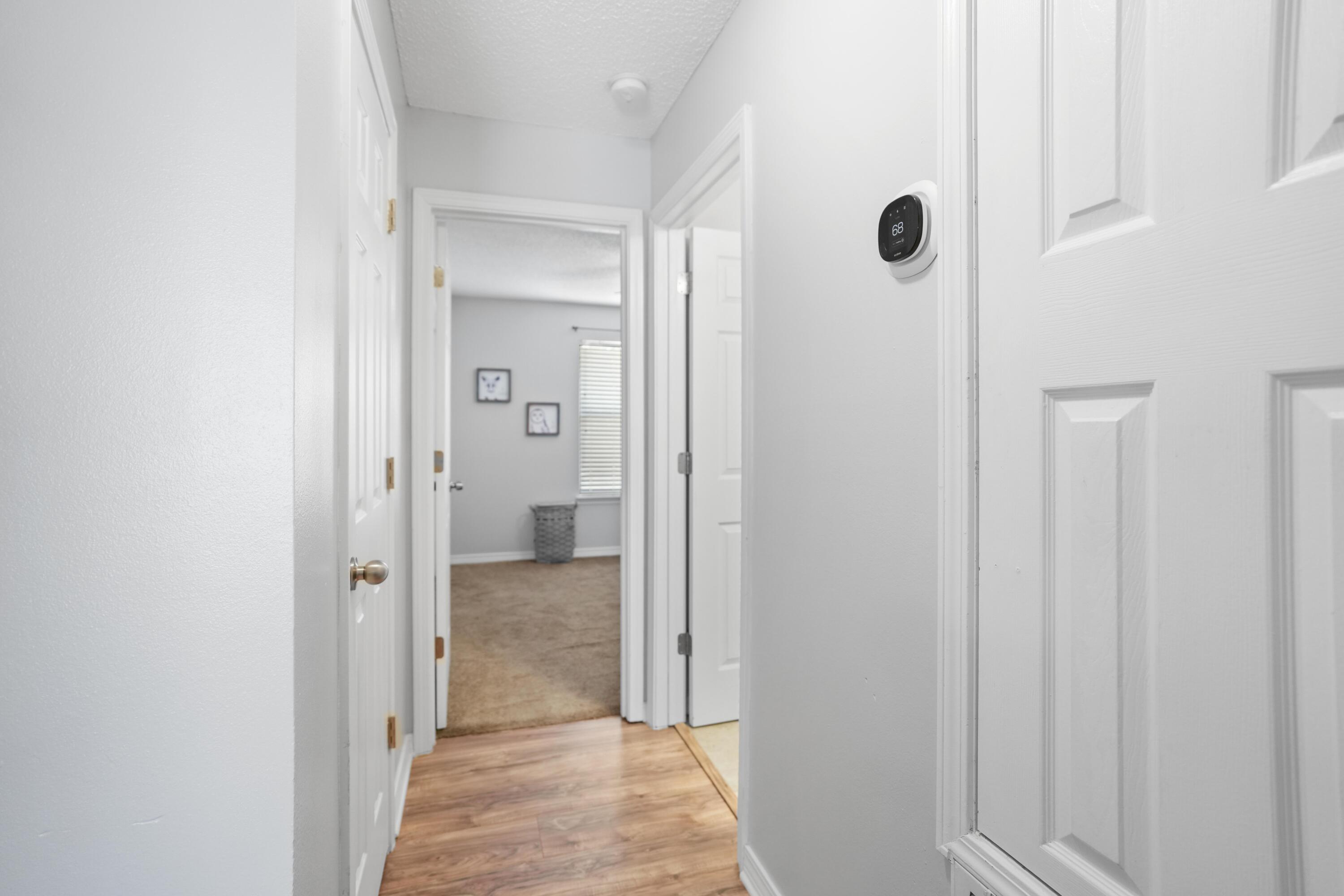 422 Jillian Drive Crestview, FL 32536 - Photo 12 of 26 a view of a bathroom from a hallway