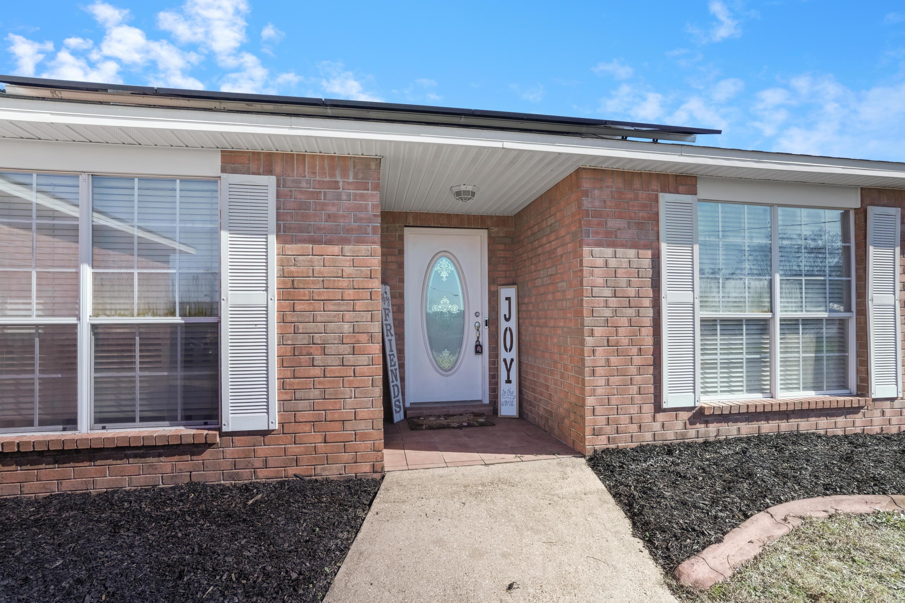 422 Jillian Drive Crestview, FL 32536 - Photo 3 of 26 a front view of a house
