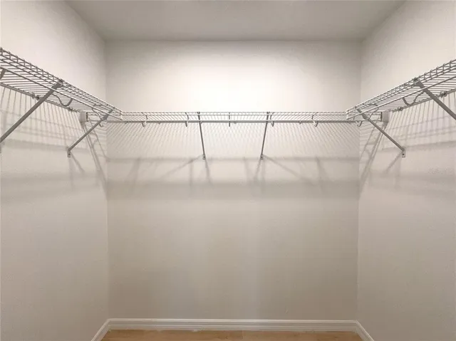 a spacious bathroom with a double vanity sink mirror and