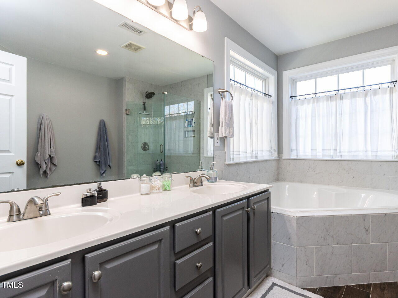 2019 Falls River Avenue Raleigh, NC 27614 - Photo 20 of 40 Updated Primary bath, new luxury vinyl flooring, seamless walk-in glass shower.