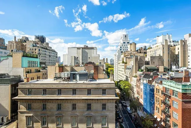 a view of a city with tall buildings
