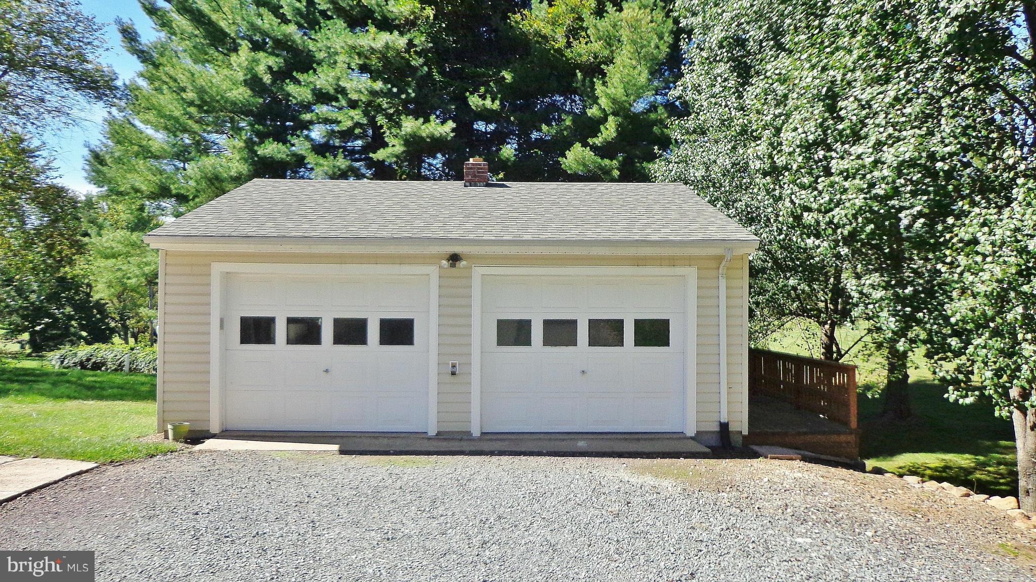 16286 Oak Shade Road Rixeyville, VA 22737 - Photo 2 of 24 a front view of a house with a yard
