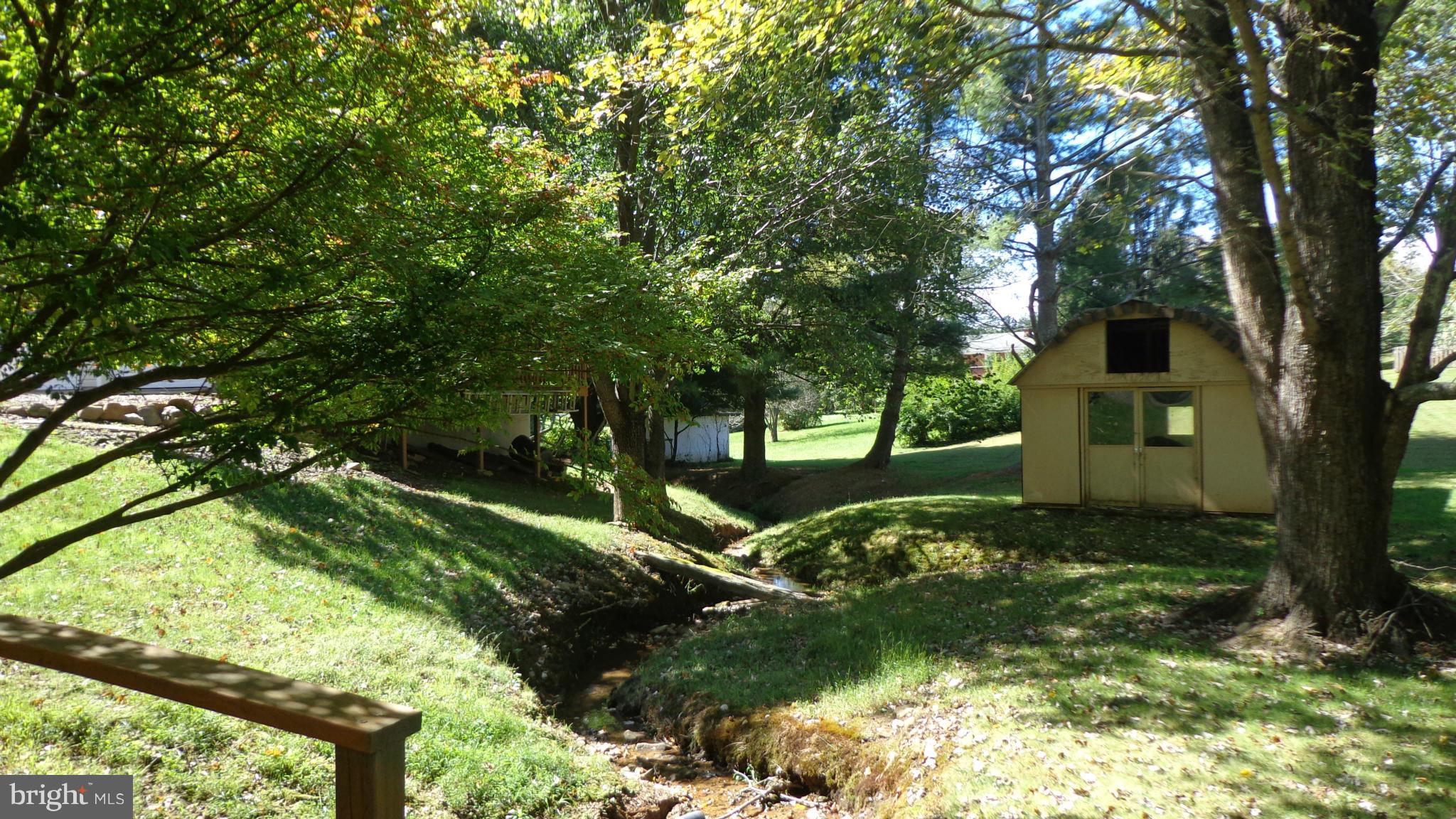 16286 Oak Shade Road Rixeyville, VA 22737 - Photo 21 of 24 a view of a garden