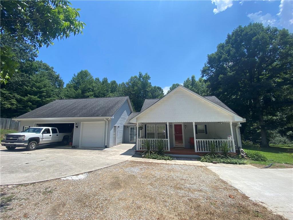 a house with trees in the background
