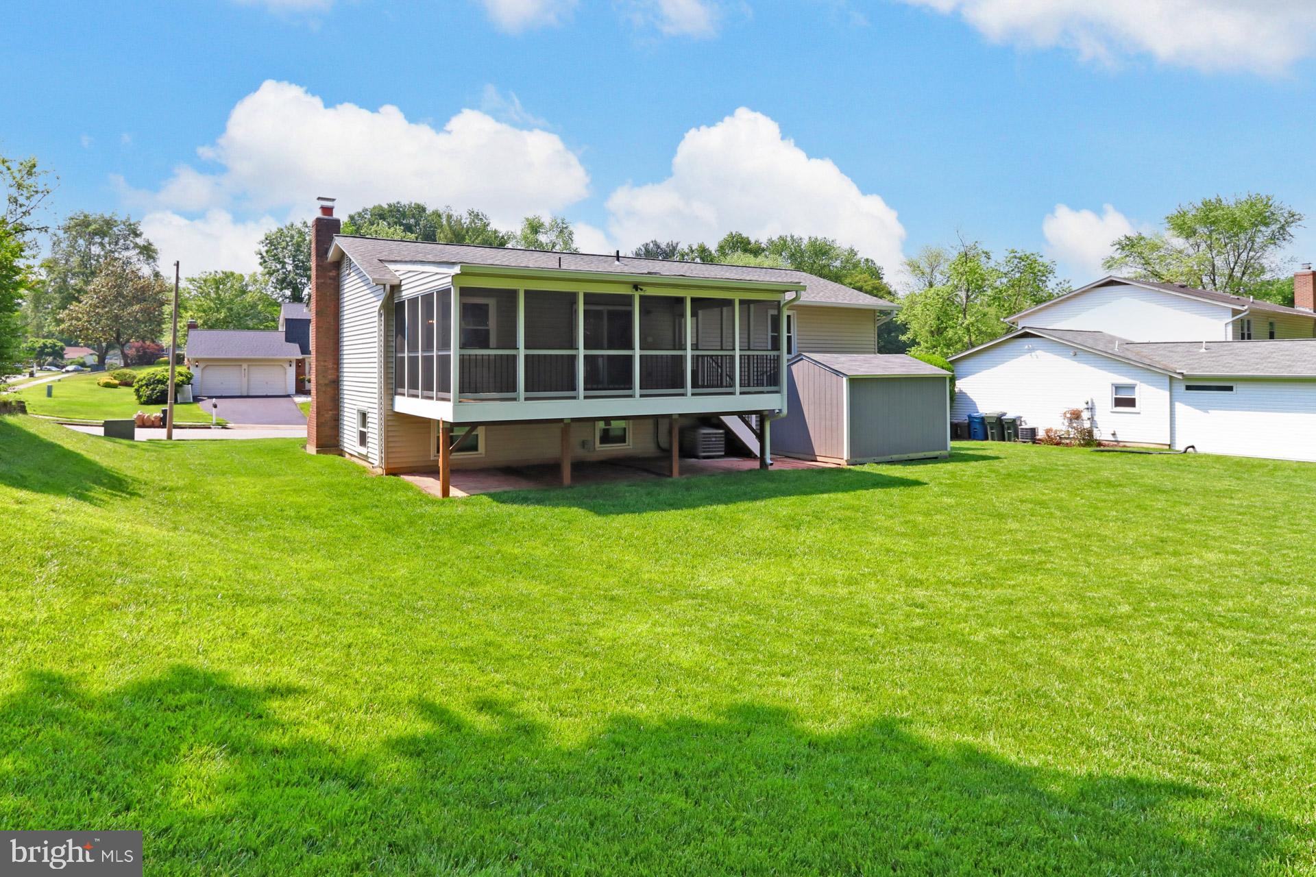 9110 Rockefeller Lane Springfield, VA 22153 - Photo 41 of 56 A level, grassy third of an acre lot