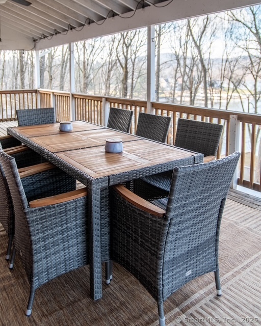 20 Musnug Road Danbury, CT 06811 - Photo 15 of 39 a outdoor dining space with furniture and wooden floor