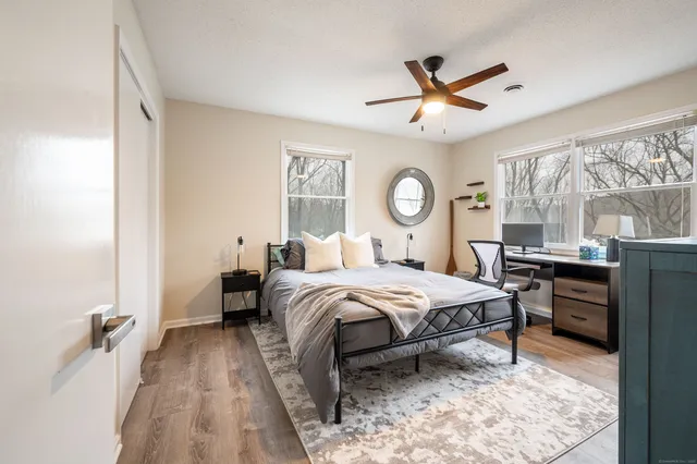 a workspace with furniture and window