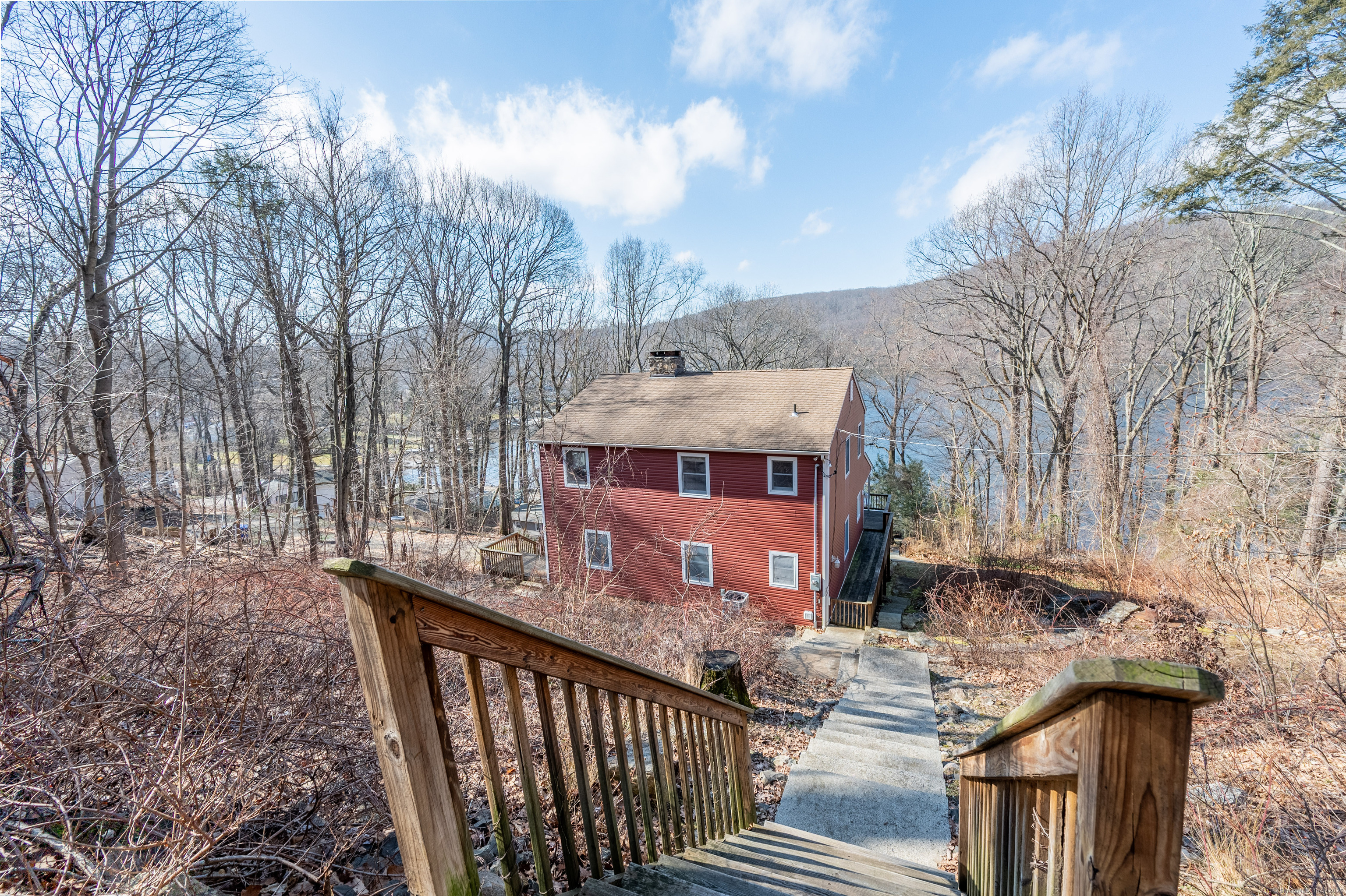 20 Musnug Road Danbury, CT 06811 - Photo 33 of 39 a balcony of a house with table and chairs
