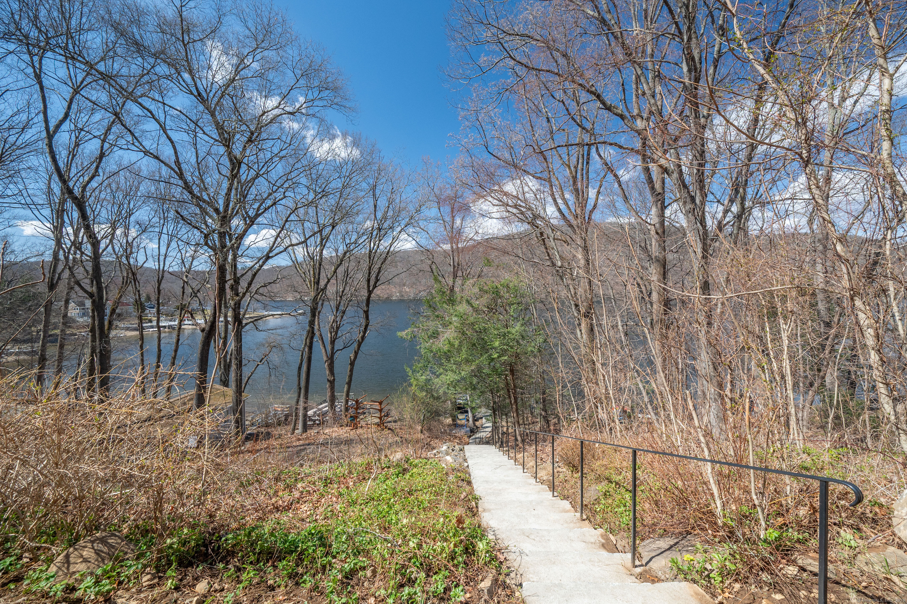 20 Musnug Road Danbury, CT 06811 - Photo 36 of 39 a backyard of a house with lots of green space