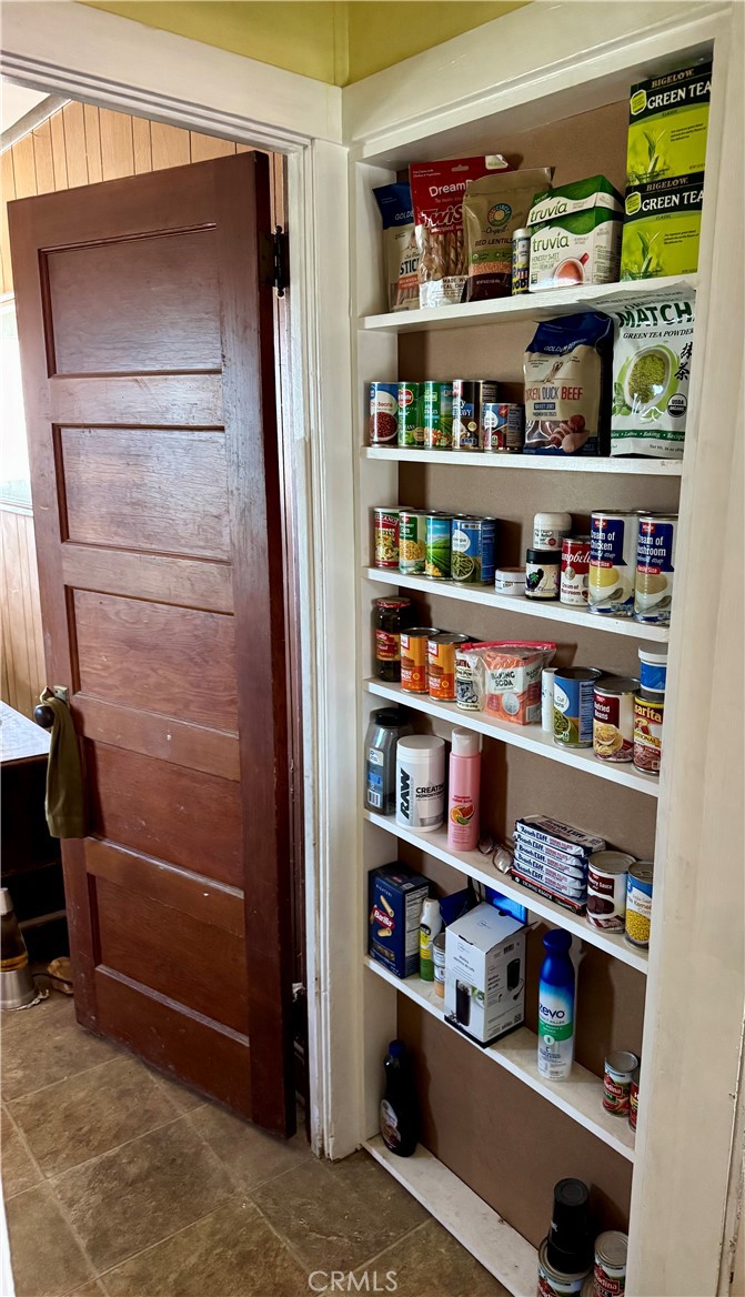 4759 Pinto Mountain Road Twentynine Palms, CA 92277 - Photo 11 of 21 a view of store room with shelves