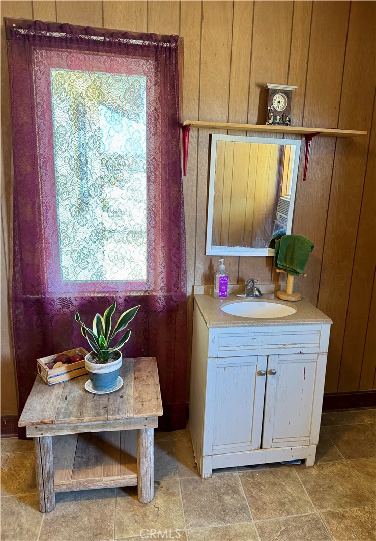 4759 Pinto Mountain Road Twentynine Palms, CA 92277 - Photo 12 of 21 a bathroom with a sink and a mirror